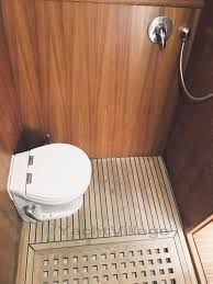 tiny.restroomshower.woodenfloor.jpg